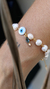 PULSEIRA OLHO GREGO E PÉROLAS - comprar online