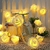 LUCES GUIRNALDA ROSAS BLANCAS A PILAS (CALIDO) - tienda online
