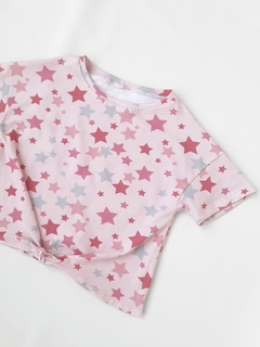 REMERA NUDO ESTRELLAS ROSA - comprar online