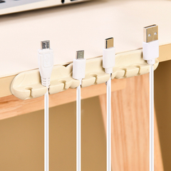 Organizador de cables con autoadhesivo