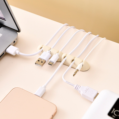 Organizador de cables con autoadhesivo en internet