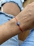 Pulsera protección regulable