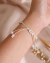 Pulseira Búzios Natural Linha Creme - comprar online