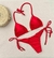 Biquíni conjunto faces de amarrar cortininha - comprar online