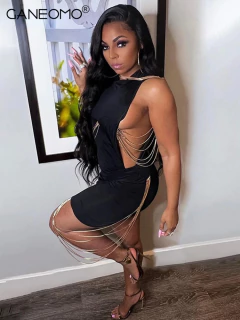 Vestido Super Sexy com Decote Lateral e Fios de Tricô Dourado. - loja online