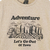 Remera jr varón jaspeada con estampa "adventure"