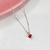 Colar ponto de luz coração vermelho