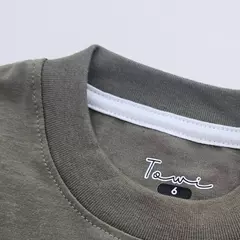 REMERA NIÑO MUSIC VERDE OSCURO en internet