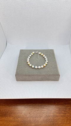 Pulseira de pérola shell e cristais coloridos. - comprar online