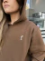 BUZO FREE CAPUCHA CHOCOLATE en internet