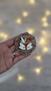 Zorrito nordico con plumas