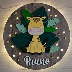 Cartel de nacimiento con luz - Jirafa con hojas en internet