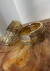 Bracelete dourado envelhecido na internet
