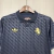 Camisa masculina azul da Juventus III 24/25, modelo torcedor, com detalhes em amarelo e padrão texturizado.