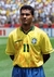 CAMISA-SELEÇÃO-BRASILEIRA-RETRO-1994-ROMÁRIO-11-TORCEDOR-UMBRO-MASCULINA-AMARELO-GOLA-POLO-PNG