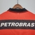 CAMISA-FLAMENGO-1-HOME-RETRO-1999-UMBRO-GOLA-POLO-TORCEDOR-MASCULINA-VERMELHO-PRETO-PETROBRAS-LUBRAX-PNG