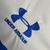 Camisa-Universidad-Católica-1-Home-Branca-2023-Torcedor-Under-Armour-Masculina-Gola-Polo-png