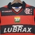 CAMISA-FLAMENGO-1-HOME-RETRO-1999-UMBRO-GOLA-POLO-TORCEDOR-MASCULINA-VERMELHO-PRETO-PETROBRAS-LUBRAX-PNG