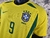 CAMISA-SELEÇÃÕ-BRASILEIRA-2002-RETRO-RONALDO-9-TORCEDOR-NIKE-MASCULINA-AMARELO-GOLA-REDONDA-PNG