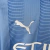 Camisa Manchester City I 23/24 - Torcedor Puma Feminina - Azul com detalhes em branco - Trajando Grifes - Futebol e NBA