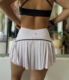 Short pollera plizada cintura compresion