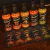 Imagem do Combo Brasileirinhas com cinco molhos de pimenta de 60ml da Chilli Brothers, incluindo as variedades Dedo de Moça, Cumari, Bode Amarela, Malagueta e Cumari do Pará.