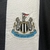 Camisa Newcastle 24/25 Home - Masculina - Modelo Torcedor - Branca e Preta - Joga 2 Imports - Camisas de Time