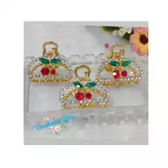 Piranha de cabelo de metal dourada com cereja - comprar online