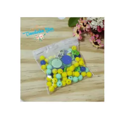 Mix de bolinha Divertida Mente - 20 grs - com 2 pingentes e duas papeletas - comprar online