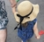 Chapéu Infantil em Palha com Detalhe em Laço e Aba Ondulada - Anjinho da guarda