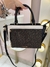 Bolsa Calvin Klein Média Preta Detalhe Branco na internet