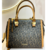 Bolsa Calvin Klein Media Monograma