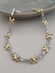Pulseira X maior em Ródio Branco Com Detalhes Em Banho de Ouro - loja online