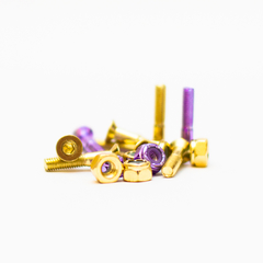 Parafuso de Base Black Sheep Dourado e Roxo na internet