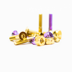 Parafuso de Base Black Sheep Dourado e Roxo - Cena Skate Shop