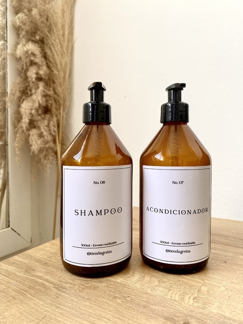 Set de dispensers shampoo y acondicionador con falla - comprar online