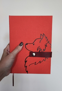 caderno coleiras - Spitz Coral