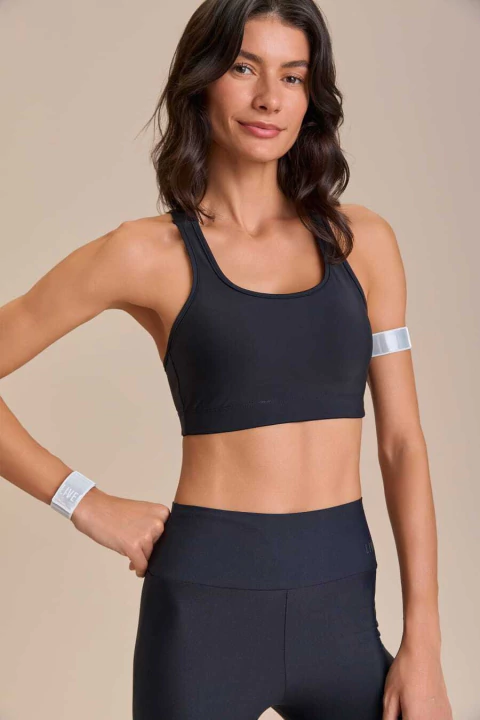 Pulseira Reflex Corrida LIVE! usada em corrida ao ar livre
