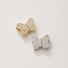 Pingente passante banhado a Ródio Branco ou Ouro 18k no formato borboleta com zircônias cravejadas.