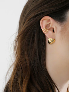 Piercing com argola tripla em Ouro 18k e Ródio Branco.