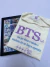 Camiseta -BTS (sig) na internet