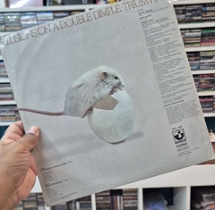 LP TRIUMVIRAT - ILLUSIONS ON A DOUBLE DIMPLE na internet
