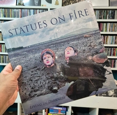 LP STATUES ON FIRE - LIVING IN DARKNESS