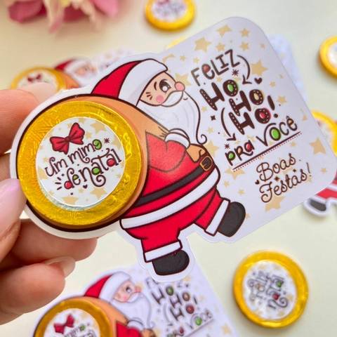 Papai Noel com Moeda de Chocolate