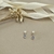 Brinco de pérola com zircônia lilás pendurada - Prata925 - Ref.: BR925093