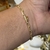 PULSEIRA CADEADO ALONGADO FECHO CANHÃO (4MM) - BANHADO A OURO 18K - comprar online