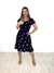 Vestido Feminino Curto, cor preta, decote canoa e estampa de borboletas.