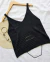 Musculosa ancha tejida calada
