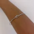 BRACELETE NÓ FINO LISO RÓDIO BRANCO na internet