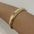 BRACELETE DESIGN HEXAGONAL DOURADO na internet